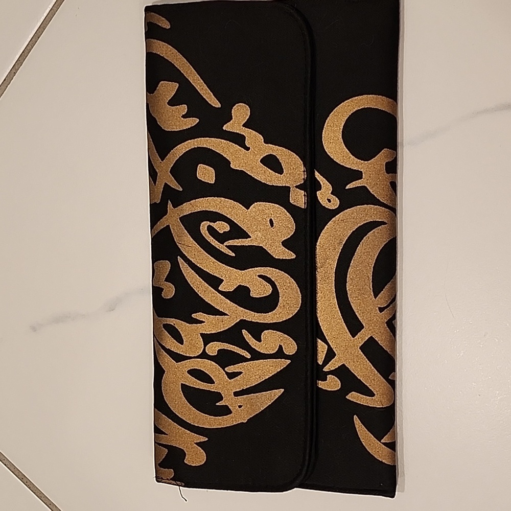 Calligraphy clutch